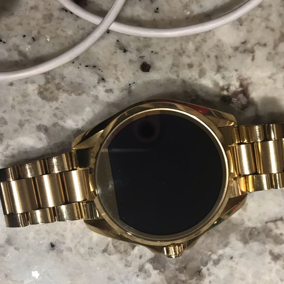Michael Kors gold tech watch